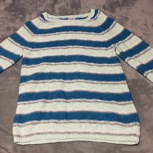 Striped sweater with sparkles throughout.